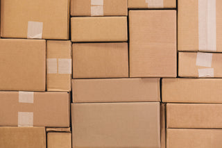 Brown cardboard boxes packed tightly together