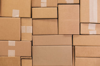 Brown cardboard boxes packed tightly together 